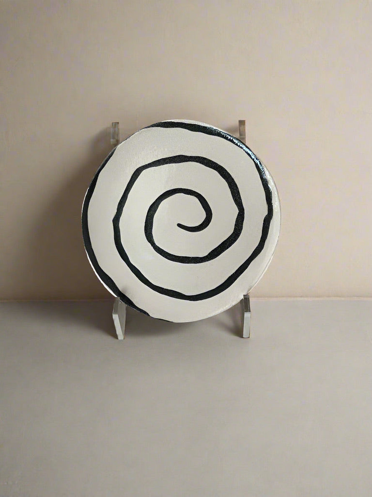 Swirl plate