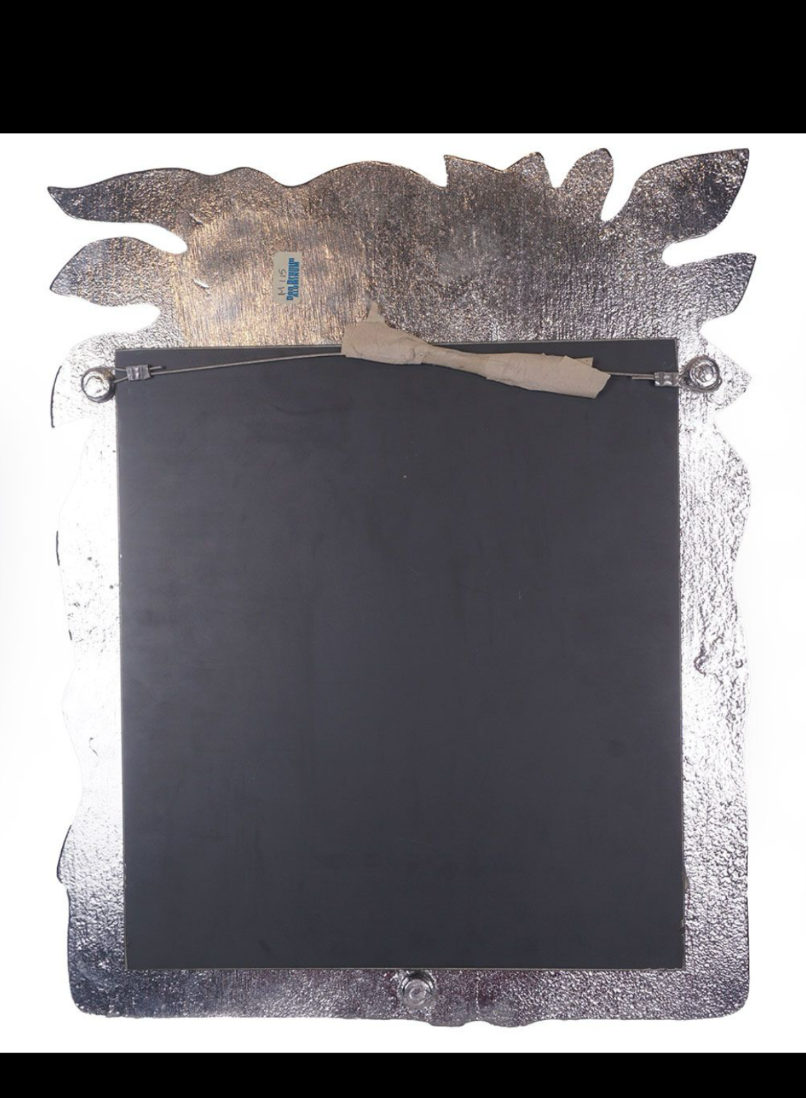 Sun face wall mirror by Donald Drumm