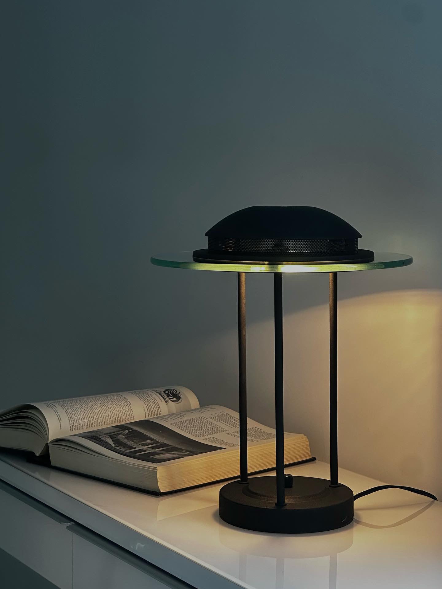 The 1980s black Saturn Desk Lamp in the style of Robert Sonneman