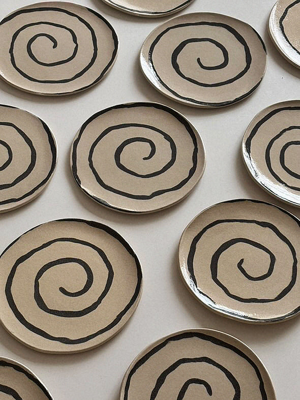 Swirl plate