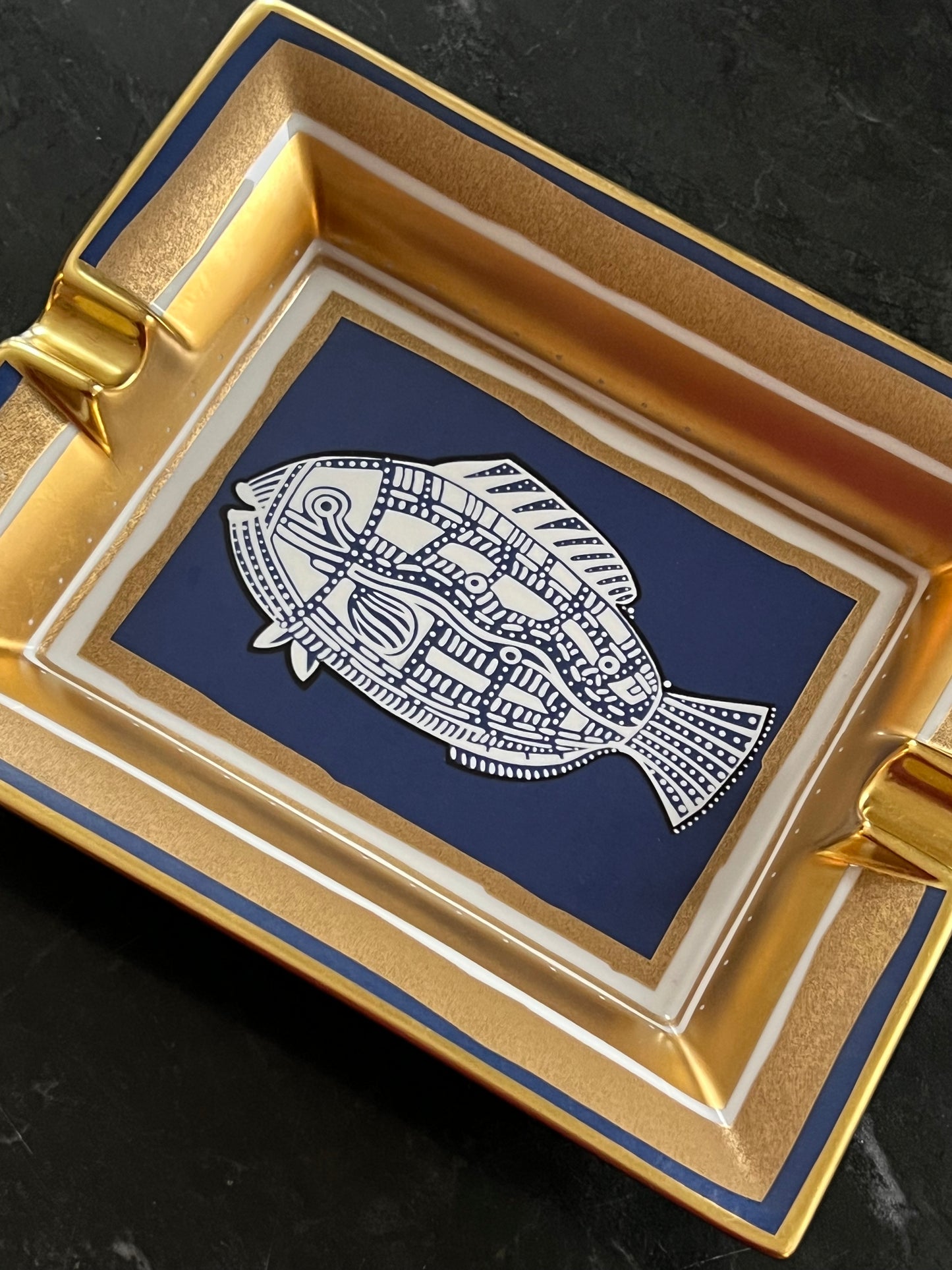 Hermès porcelain ashtray with fish motif, 1970s-1980s