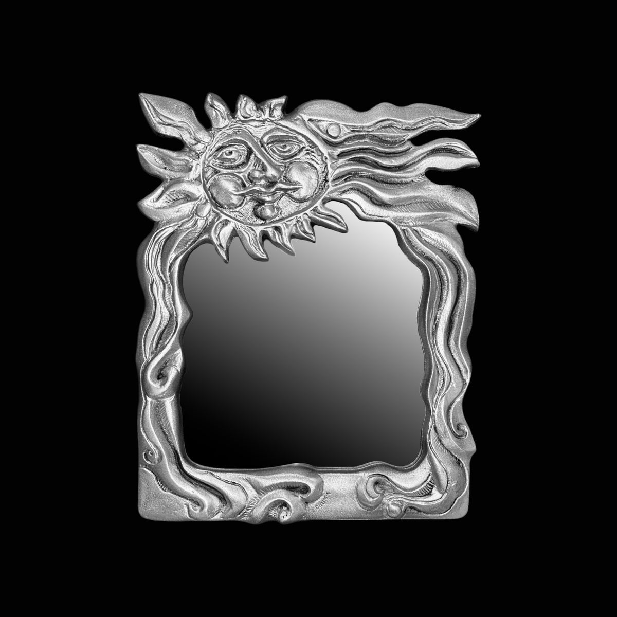 Sun face wall mirror by Donald Drumm