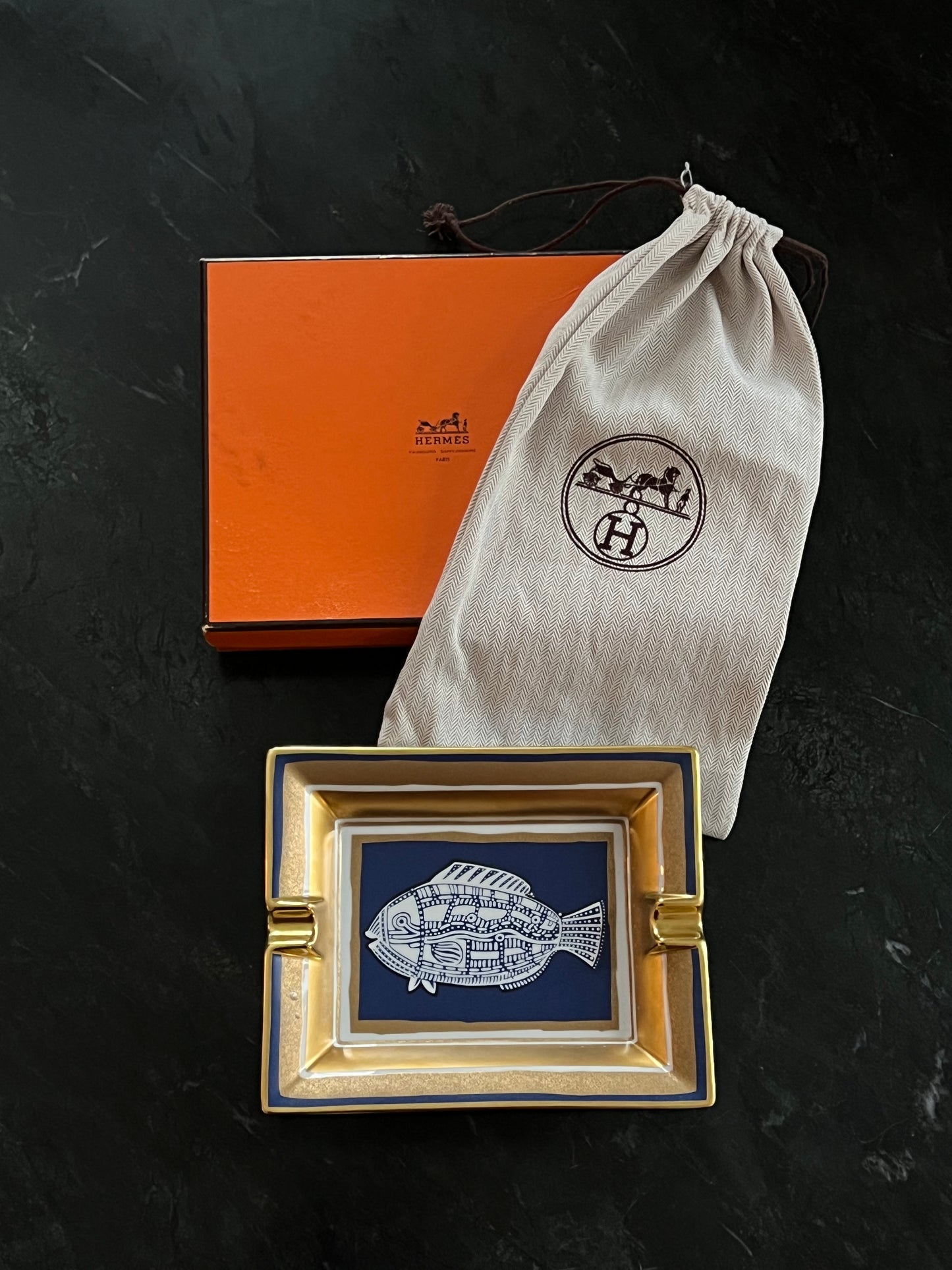Hermès porcelain ashtray with fish motif, 1970s-1980s