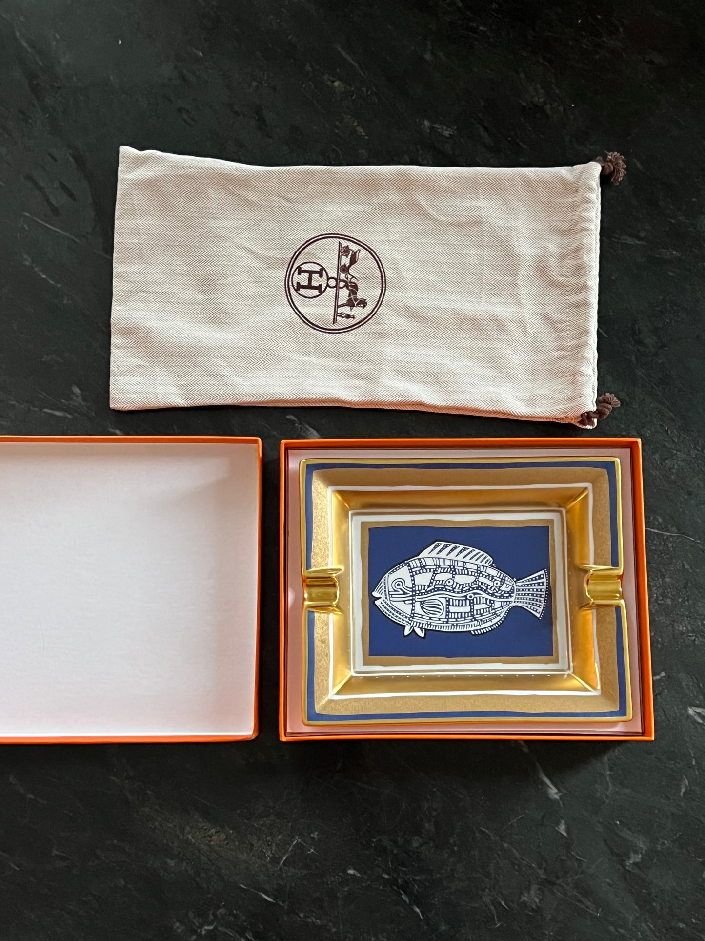 Hermès porcelain ashtray with fish motif, 1970s-1980s