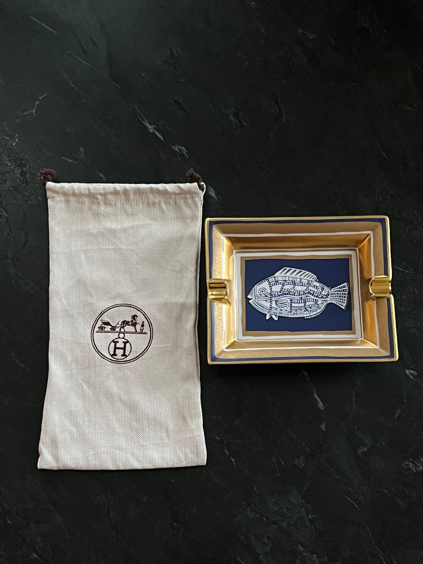 Hermès porcelain ashtray with fish motif, 1970s-1980s