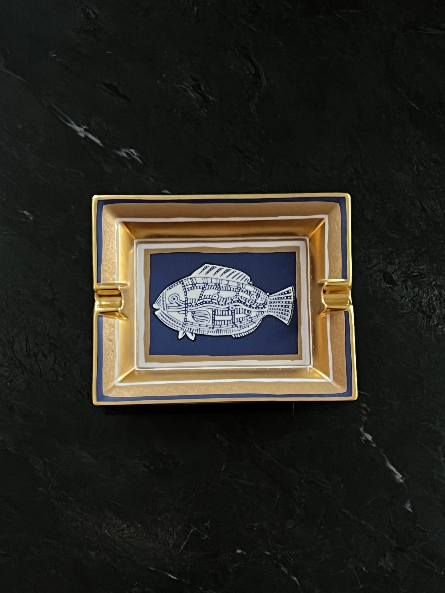 Hermès porcelain ashtray with fish motif, 1970s-1980s