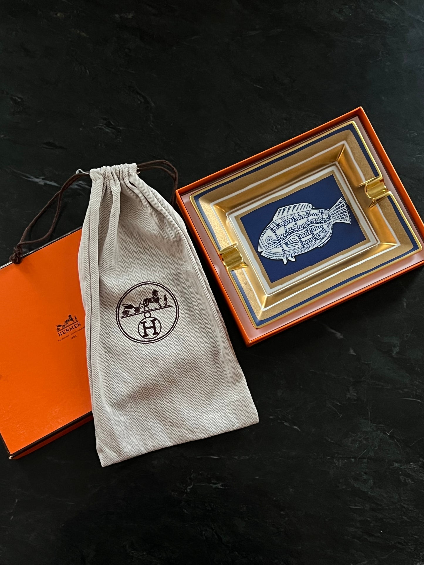 Hermès porcelain ashtray with fish motif, 1970s-1980s