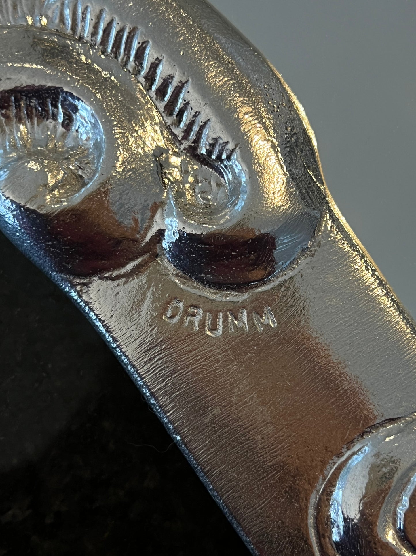 Sun face wall mirror by Donald Drumm