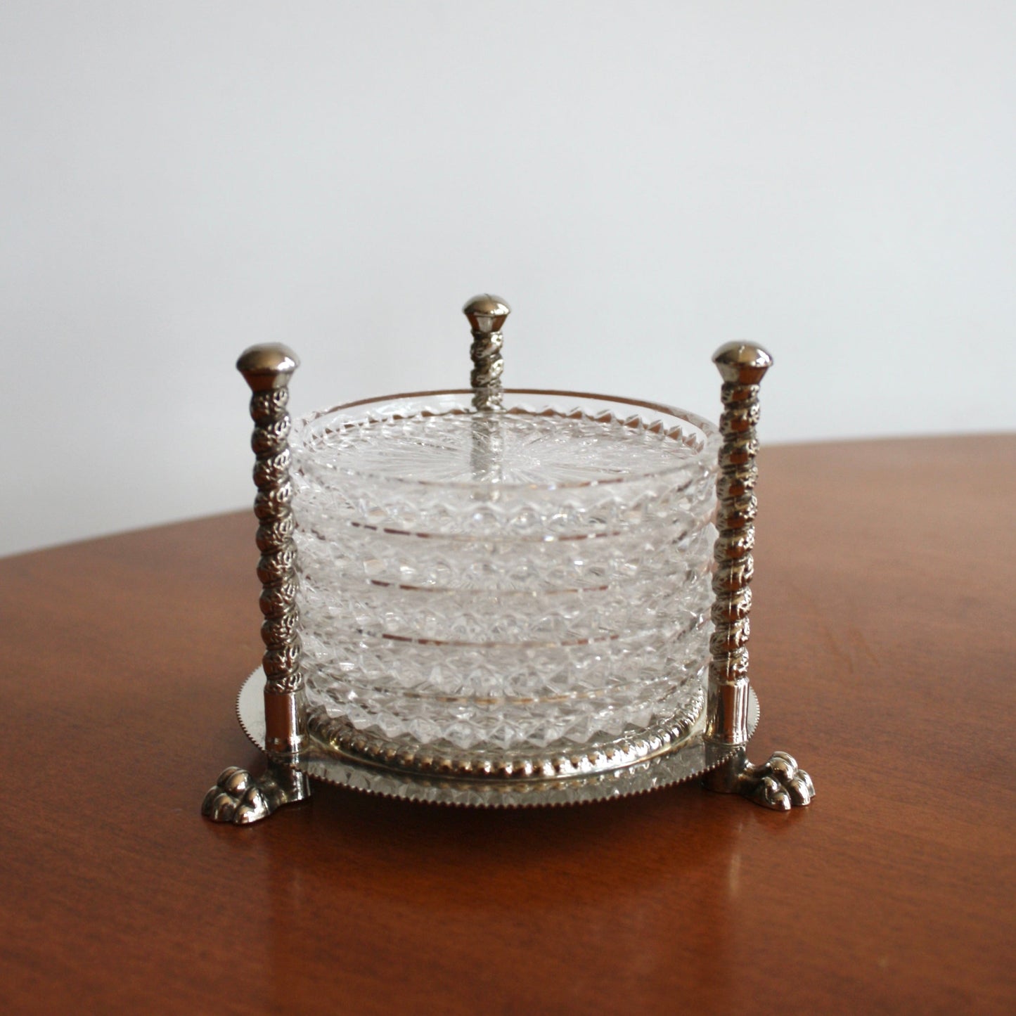 Crystal coaster set with Silver Plated Clawfoot Holder by F. B. Rogers